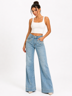 Jeans acampanados de tiro alto con perlas