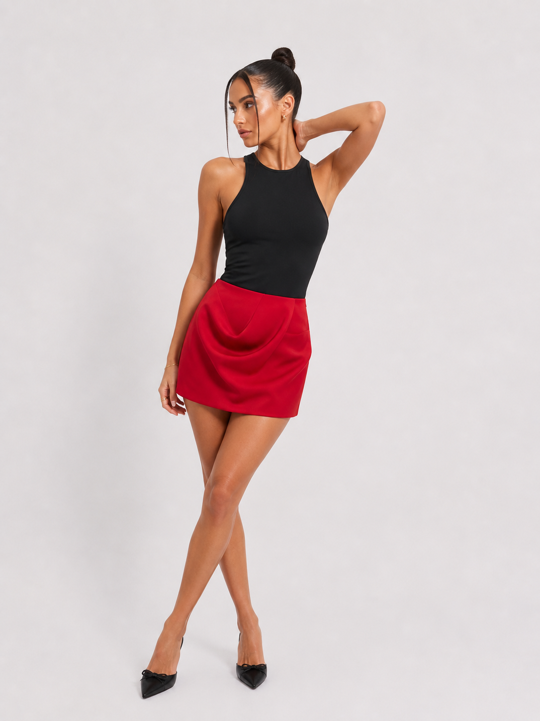 Falda plisada corta roja