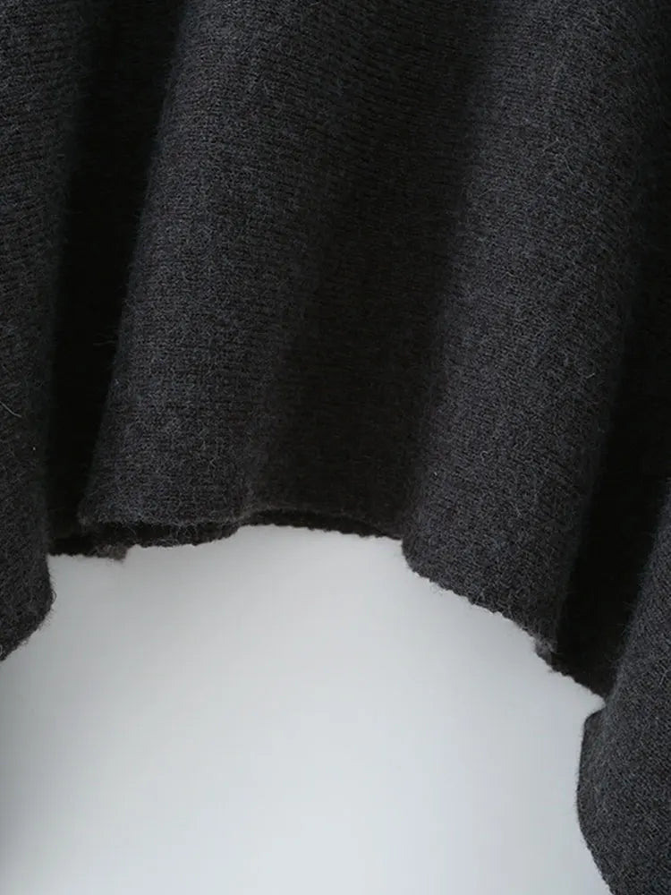 Suéter de punto suelto cuello vuelto