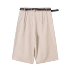 Shorts de tiro alto con pliegues y cinturón