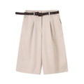 Shorts de tiro alto con pliegues y cinturón