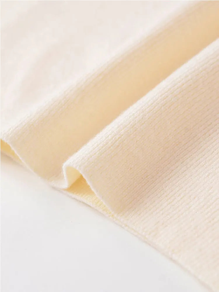 Suéter de punto fuera del hombro