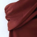 Vestido largo de cuello asimétrico