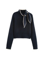 Knitted jumper with bow