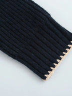 Knitted jumper with bow