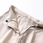 Shorts de tiro alto con pliegues y cinturón