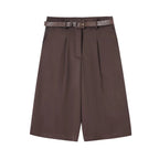 Shorts de tiro alto con pliegues y cinturón