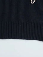 Knitted jumper with bow