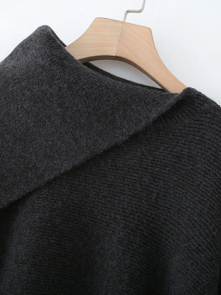 Suéter de punto suelto cuello vuelto